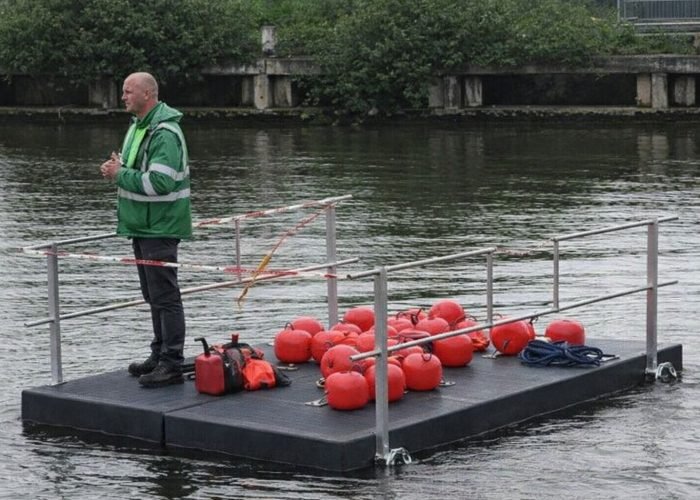 Modular floating platform quikdok man on platform